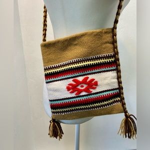 Amazing handmade crossbody wool Cosatal Cowgirl bag with designs on both sides.